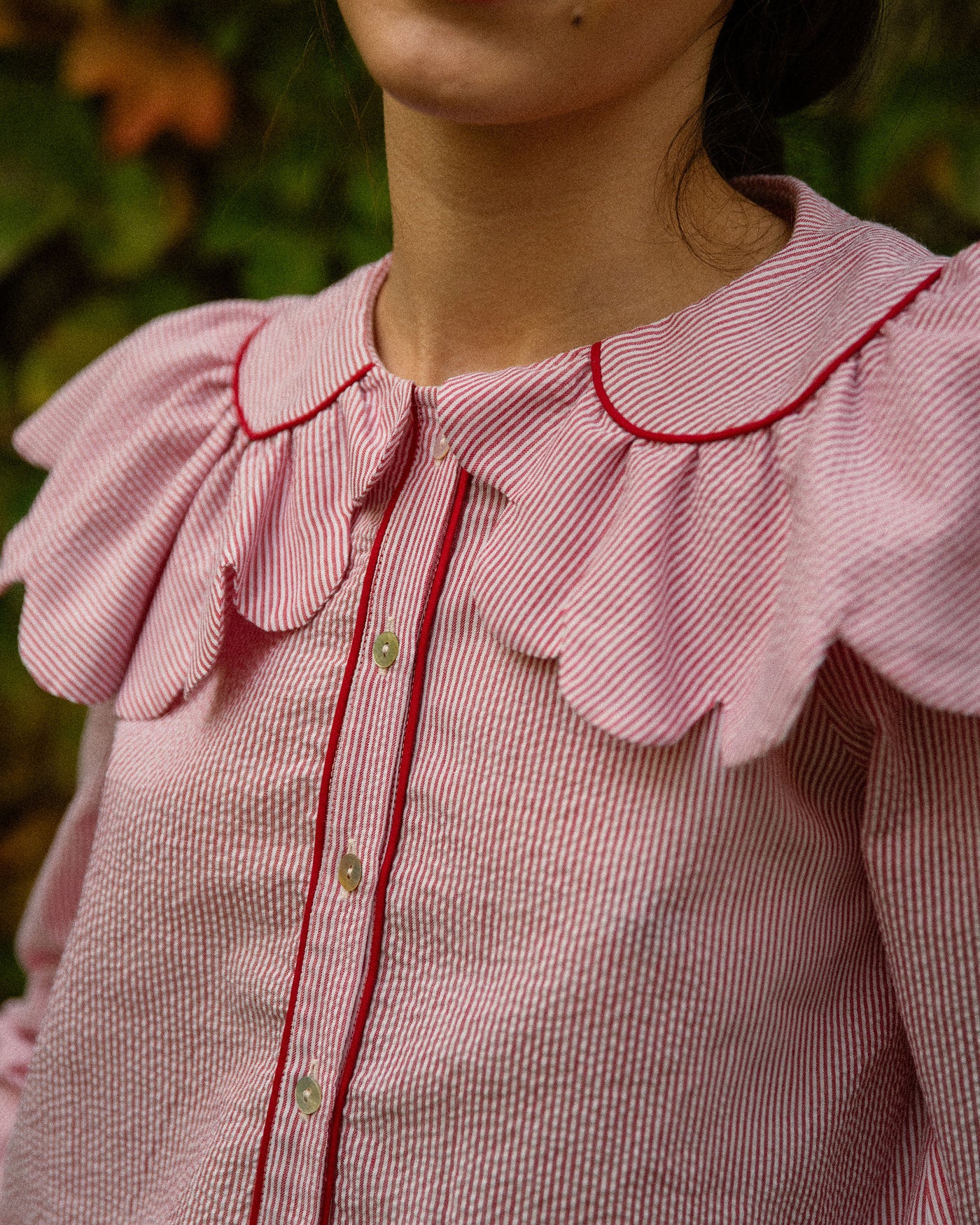 Blusa Naif Rayas Rojas